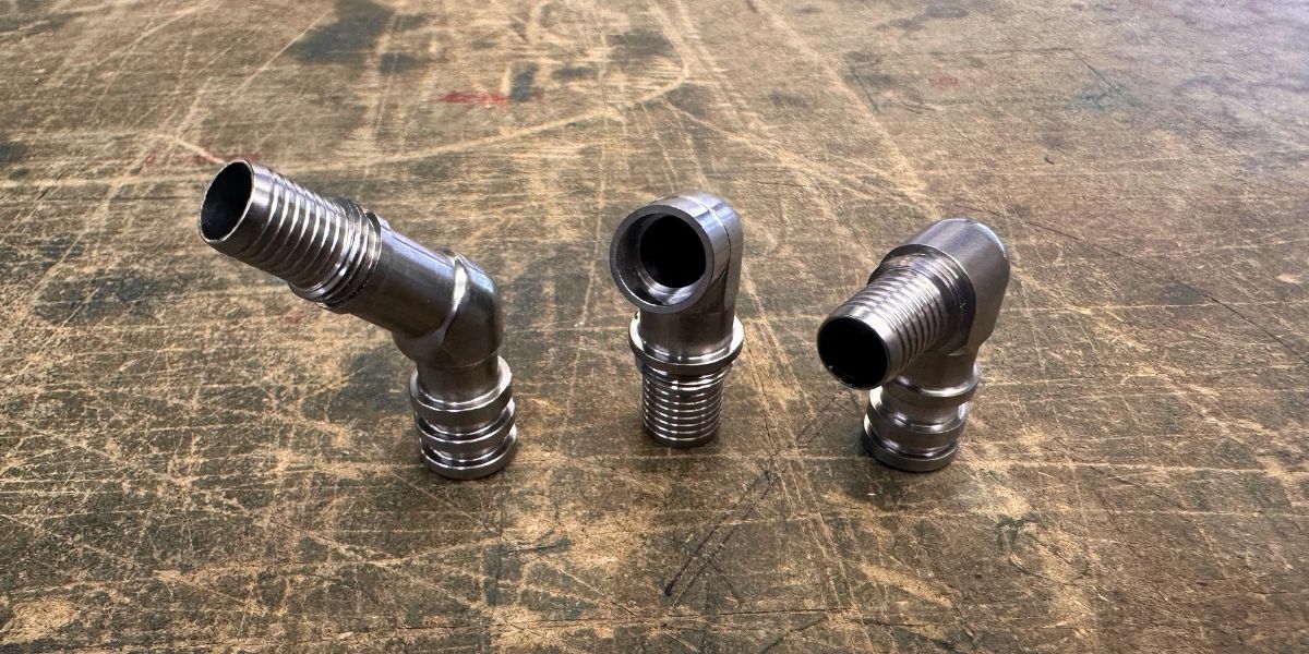 Precision fluid connector components machined for Formula 1