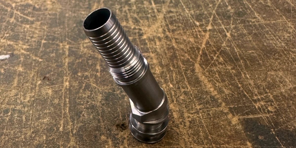 Precision fluid connector components machined for Formula 1