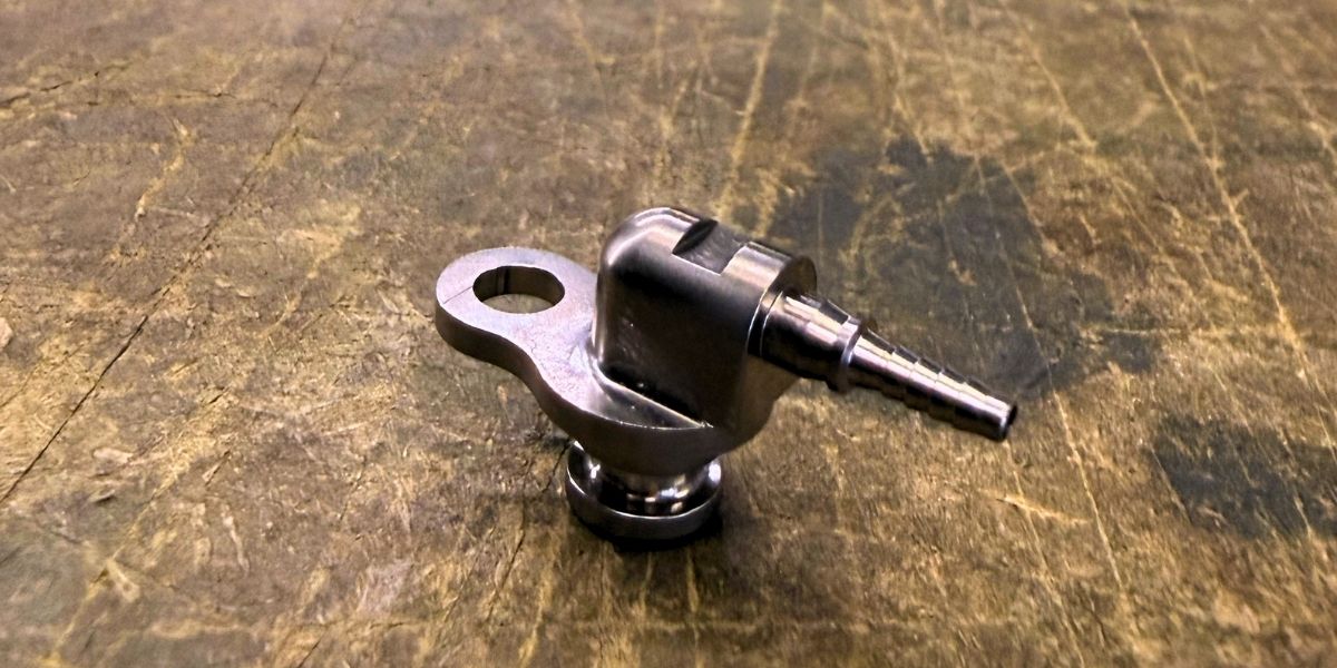 Precision fluid connector components machined for Formula 1
