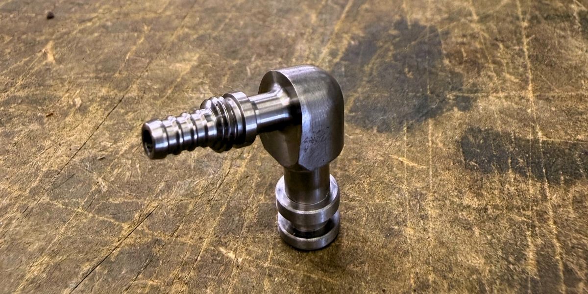 Precision fluid connector components machined for Formula 1