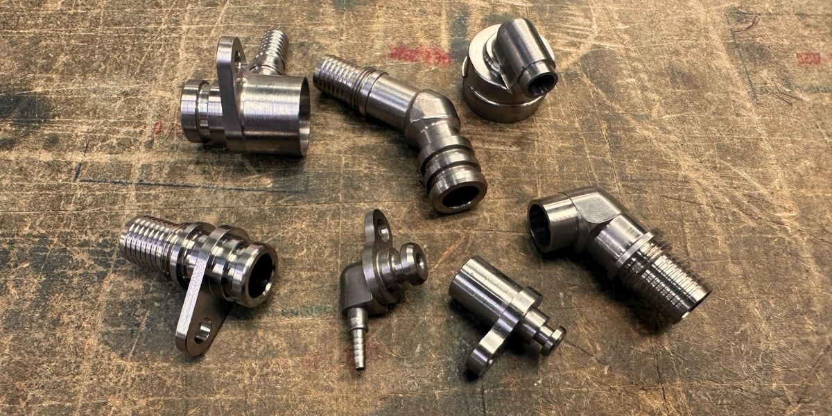 Precision fluid connector components machined for Formula 1